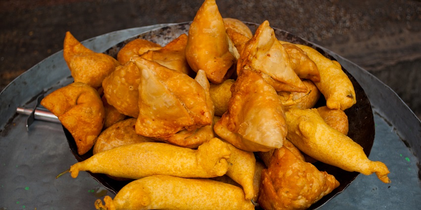 Samosas, a crispy pastry filled with spiced potatoes and peas are popular street food in Rishikesh.