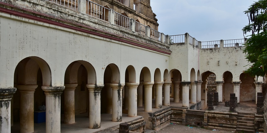Exterior view of the Royal Palace in Thanjavur with detailed brick architecture.