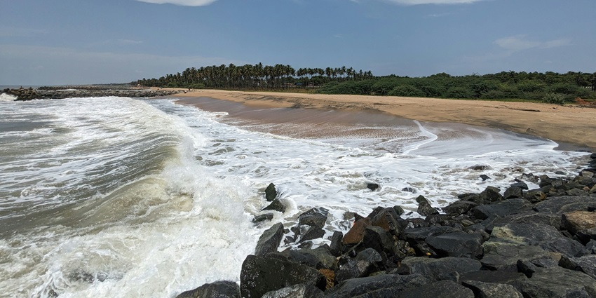 A serene view of Sanguthurai Beach, an attraction near the Nagercoil Temple.