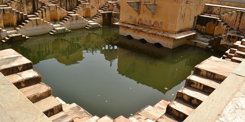 Stepwell structure of Panna Miyan Ka Kund with arched walls and symmetrical design