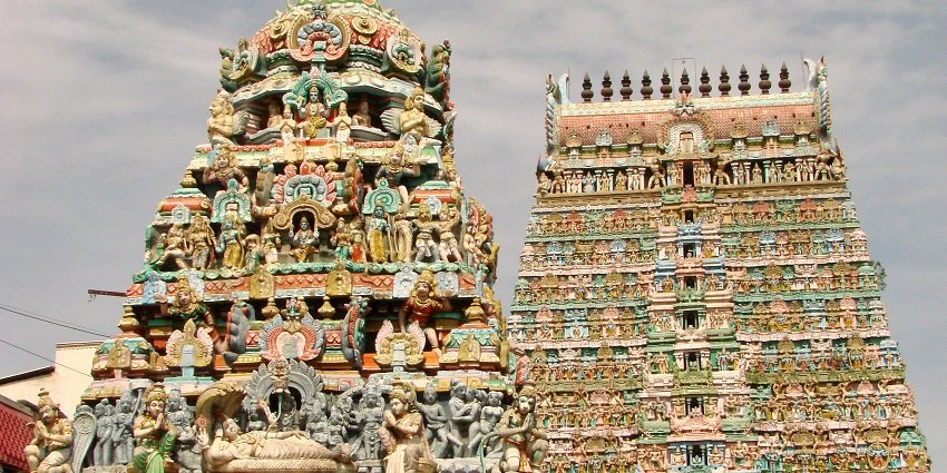 Temple’s grand gopurams, richly adorned with detailed carvings and colourful sculptures.