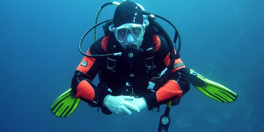 A picture of a diver exploring underwater marine life through Dandi Beach water sports.