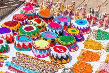 A view of colourful hats and handicraft items being sold at the market in Uttar Pradesh.