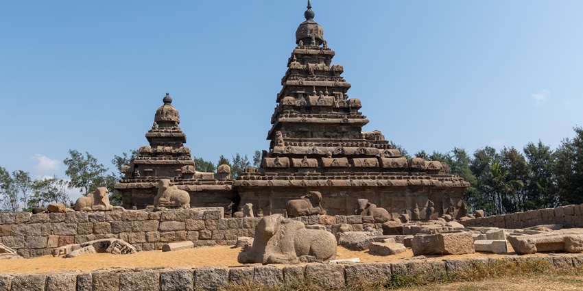 Ancient seaside temple complex with Dravidian architecture, stone carvings, and UNESCO World Heritage status.