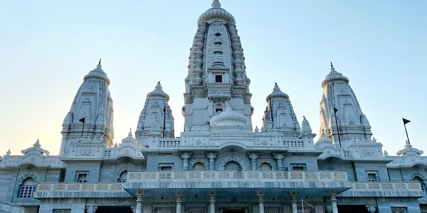 Image of a temple with intricate carvings like the Shri Shyam Ji Maharaj Mandir.