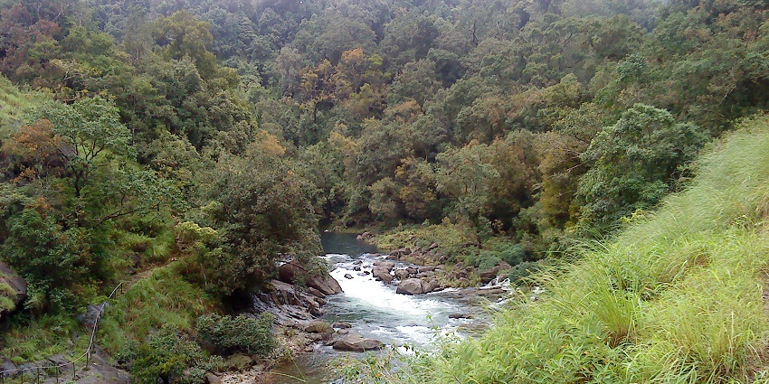 Beautiful View of River flowing through lush green Valley