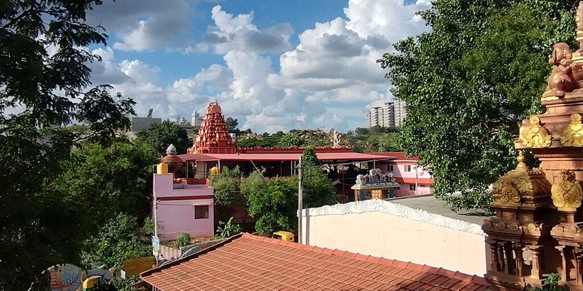 Shrungagiri Sri Shanmukha Swamy Temple, surrounded by greenery and a serene landscape