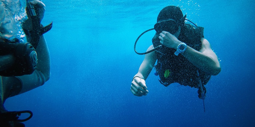An underwater picture of a snorkeller enjoying one of the Divegar beach water sports