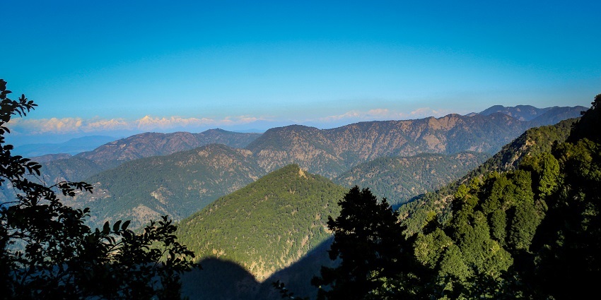 A Breathtaking panoramic view of snow-capped mountains and valleys at Snow View Point.