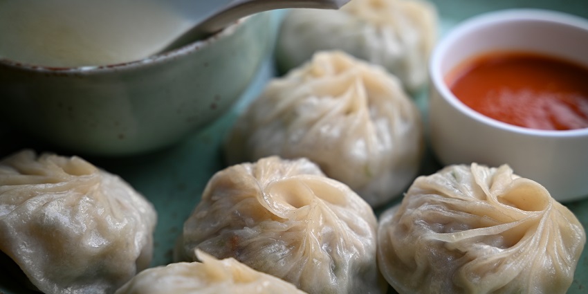 The best food in Nainital is Tibetan momos served in a cozy fast-food setting.