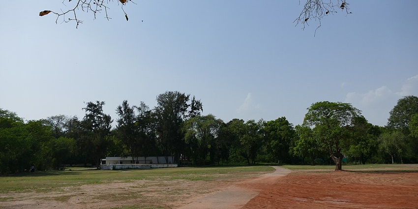 Peaceful Silvi Park with lush lawns, flowerbeds, and walking paths, perfect for relaxing outdoor time
