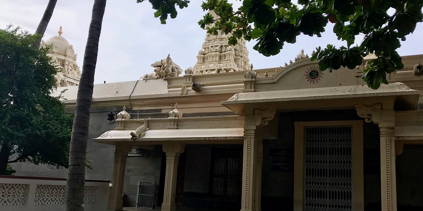 Sri Ramana Maharshi Ashram's peaceful ashram structure is nestled in verdant gardens.