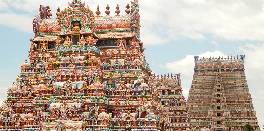 Gopurams of Sri Ranganathaswamy Temple featuring intricate stone sculptures covering the tower