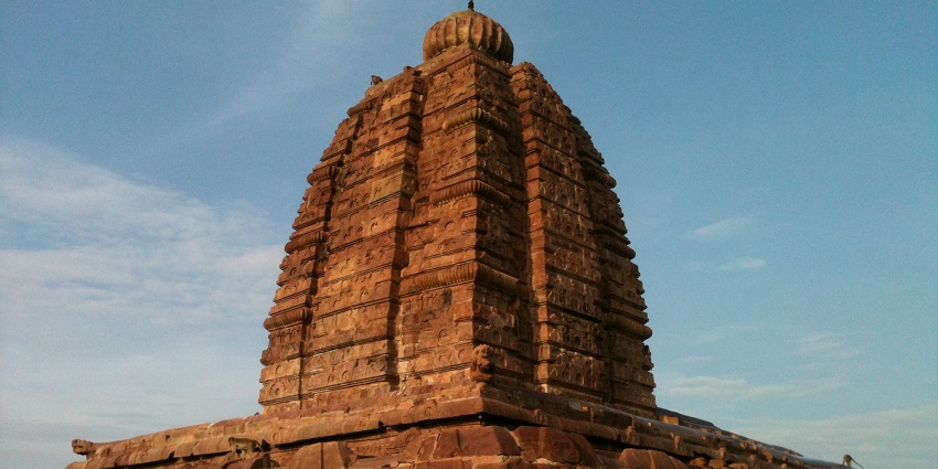 A photo of the stone temple against a clear blue sky, reflecting the famous temples in Erode