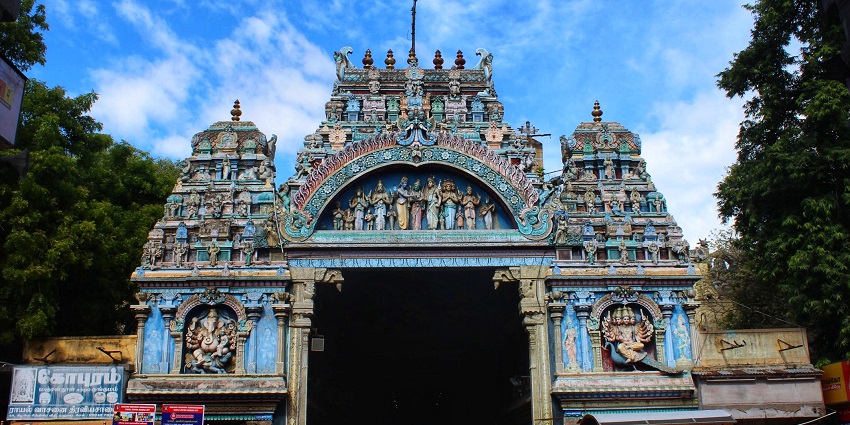 Sri Vakra Kali Amman Sannathi Temple entrance with intricate carvings and blue sky