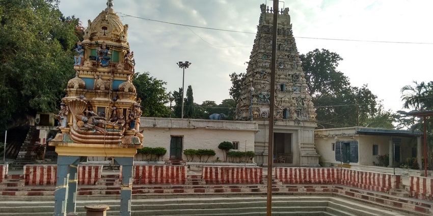 A temple surrounded by steps and pillars, reflecting the peaceful ambience of the shrine.