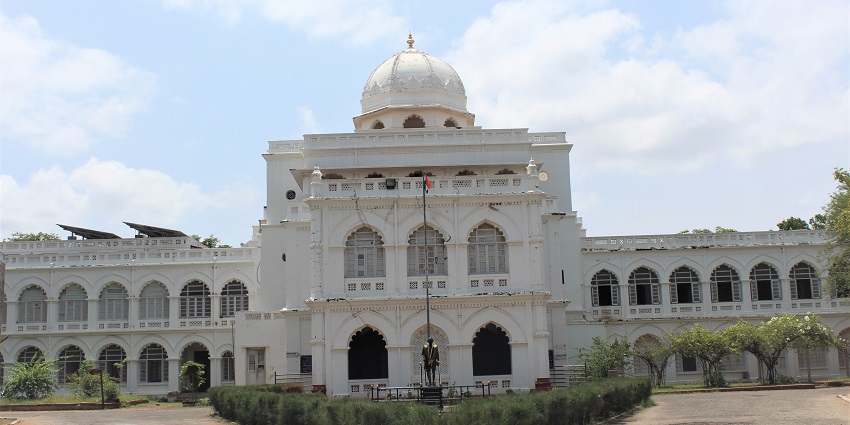 The Gandhi Memorial Museum features an architectural design surrounded by landscaped gardens.