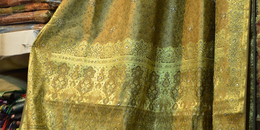 Close up view of a silk saree at Sumangal Banaras, one of the popular places for saree shopping in Varanasi