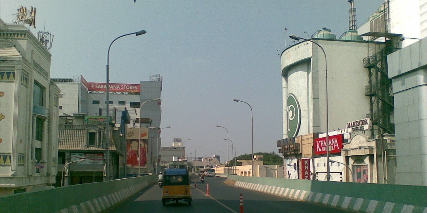 Bustling night shopping experience at T. Nagar in Chennai with well-lit streets and shops.