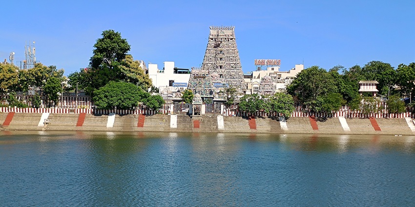 A vibrant street in Mylapore featuring ancient temples, colonial-era churches, and bustling local markets.