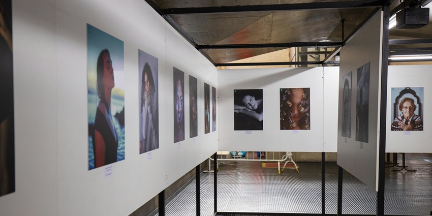 Inside the halls of Churchgate Heritage Gallery with art hanging on the wall.