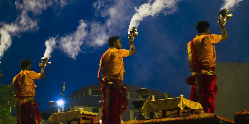 Devotees participating in the Ganga Aarti, one of the spiritual things to do in Rishikesh.
