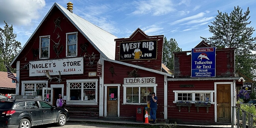 Negley’s store in Talkeetna near a Deli & Pub and an Air Taxi rental store.