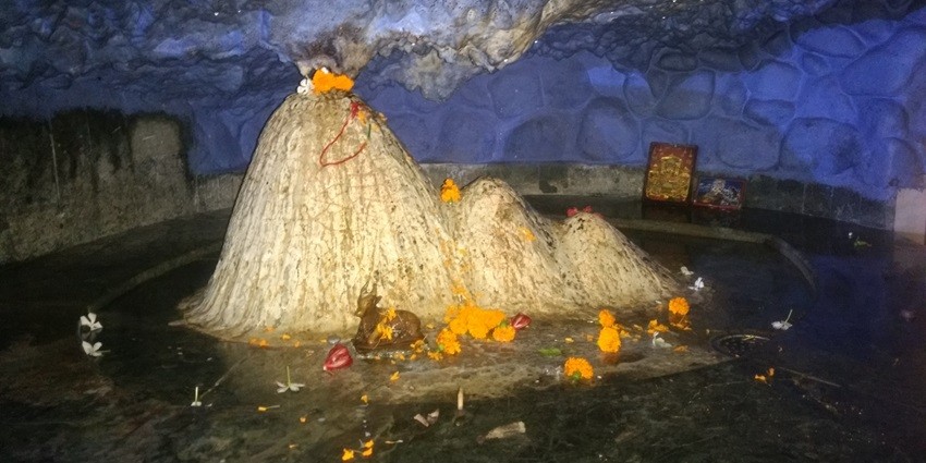 Ancient temple dedicated to Lord Shiva, nestled in caves