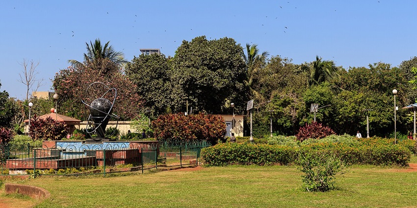 View of a beautiful Garden in Mumbai, showcasing terraced greenery and cityscape.