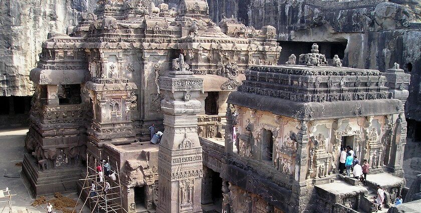 An aerial picture of a temple showing the traditional architecture and devotees worshipping