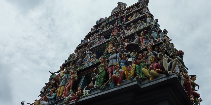 Mariamman Temple's gopuram with intricate carvings and detailed colourful sculptures