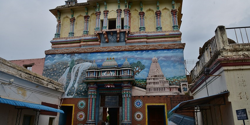 A historical palace with huge architecture and a bell tower.