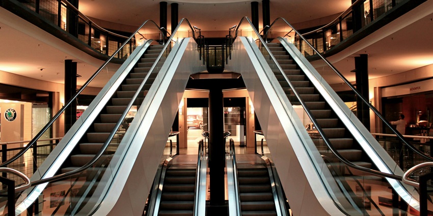An image of escalators inside a mall, highlighting the best place near Wow Adventure Park.