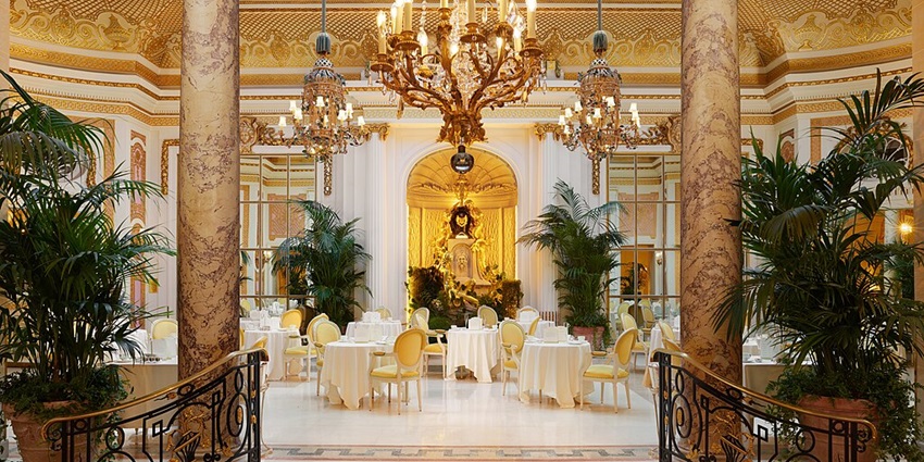 The Palm Court features elegant dining with beautiful outdoor views.