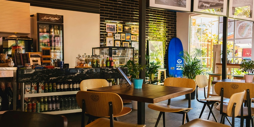 Casual café in Mussoorie with a menu featuring international cuisine options.