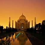 A stunning view of the Taj Mahal, an iconic white marble mausoleum located in Agra.