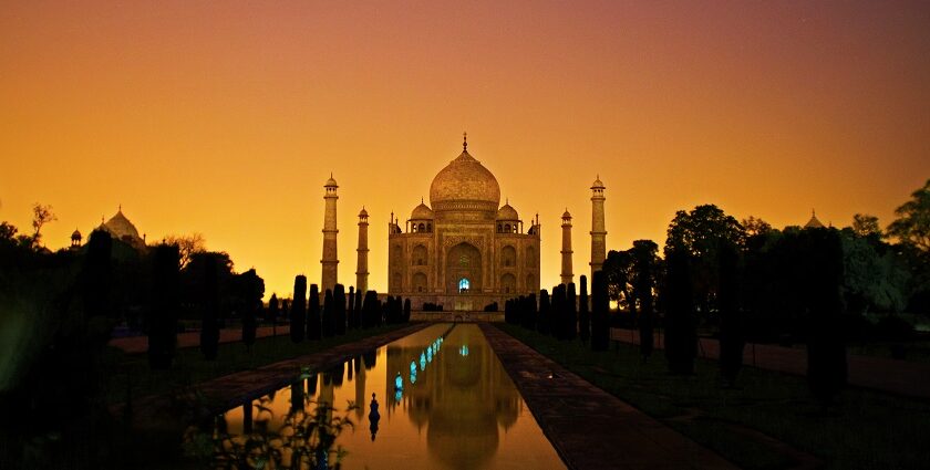 A stunning view of the Taj Mahal, an iconic white marble mausoleum located in Agra.