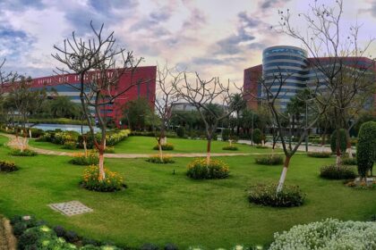 A picture of Greater Noida city, showcasing its high-rise buildings, and sprawling green spaces.