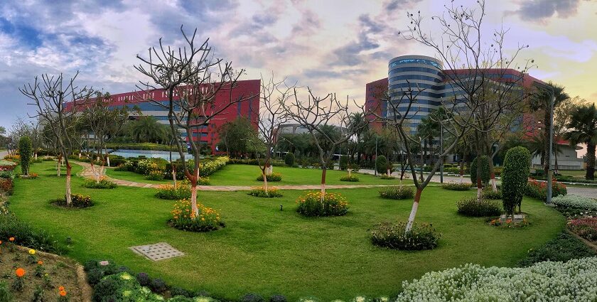 A picture of Greater Noida city, showcasing its high-rise buildings, and sprawling green spaces.