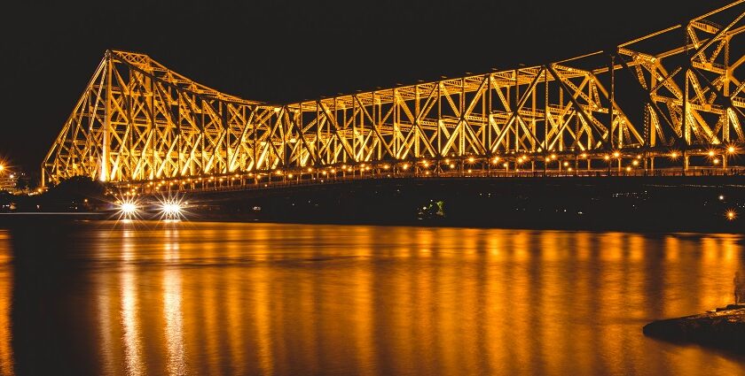 Explore the iconic Howrah Bridge, Howrah showcasing the vibrant things to do in Howrah.