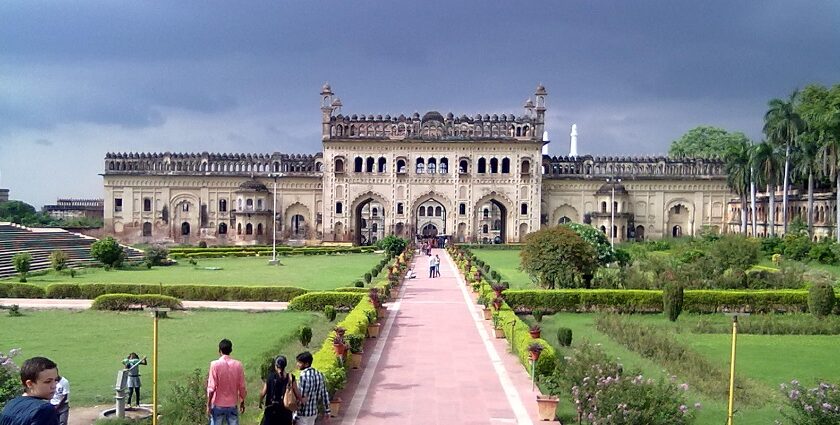 An image of Imamabara in daylight with busy roads and beautiful architecture in Lucknow, India.