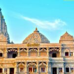 An image showing devotees visiting Prem Mandir, makes visiting this temple one of the things to do in Vrindavan.