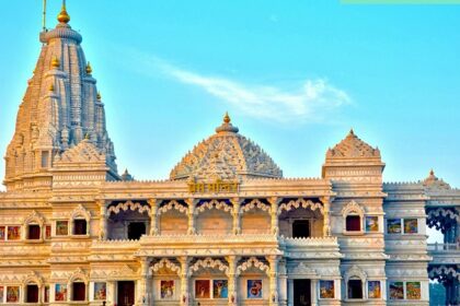 An image showing devotees visiting Prem Mandir, makes visiting this temple one of the things to do in Vrindavan.