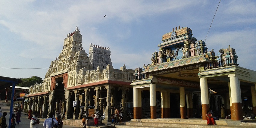 Thiruchendur Murugan Temple with its towering gopuram and complex area filled with people