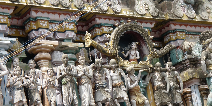Dome with Intricate carvings of various characters from mythology in Thirukkadaiyur Temple.