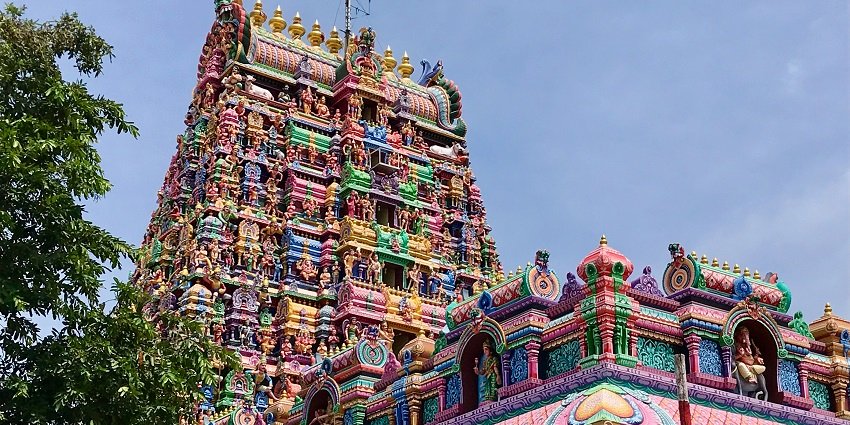 Gopuram of Thirukkadaiyur Temple with intricate carvings and beautifully made statues