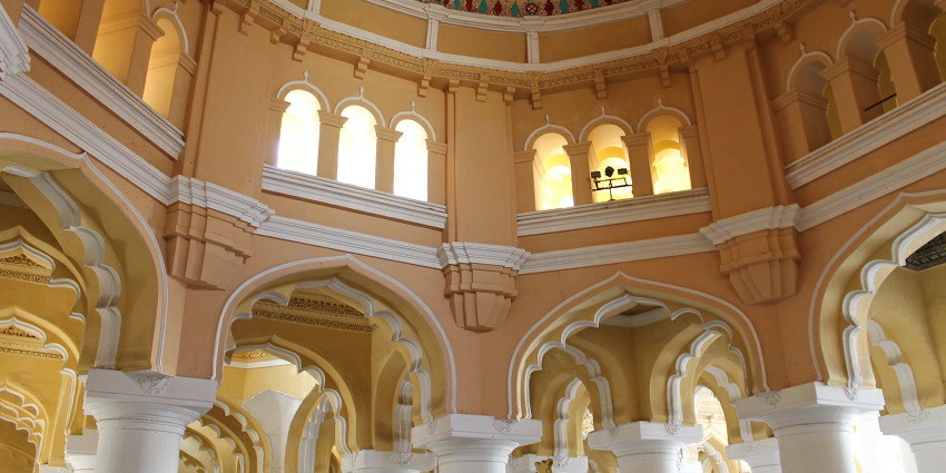 The intricately designed roof of Thirumalai Nayak Palace's Durbar Hall showcases detailed patterns.