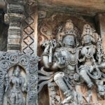 A carving of Lord Shiva with Goddess Parvati in Thirumanancheri temple