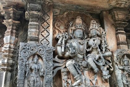 A carving of Lord Shiva with Goddess Parvati in Thirumanancheri temple