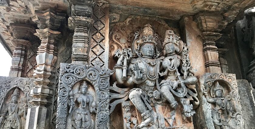 A carving of Lord Shiva with Goddess Parvati in Thirumanancheri temple